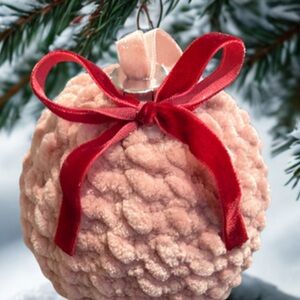 Elegant Pink Velvet Ornament with Red Bow